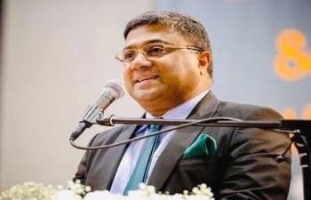 Ambassador Sibi George with Mata Amritanandamayi during Amma’s visit to Winterthur in  Switzerland